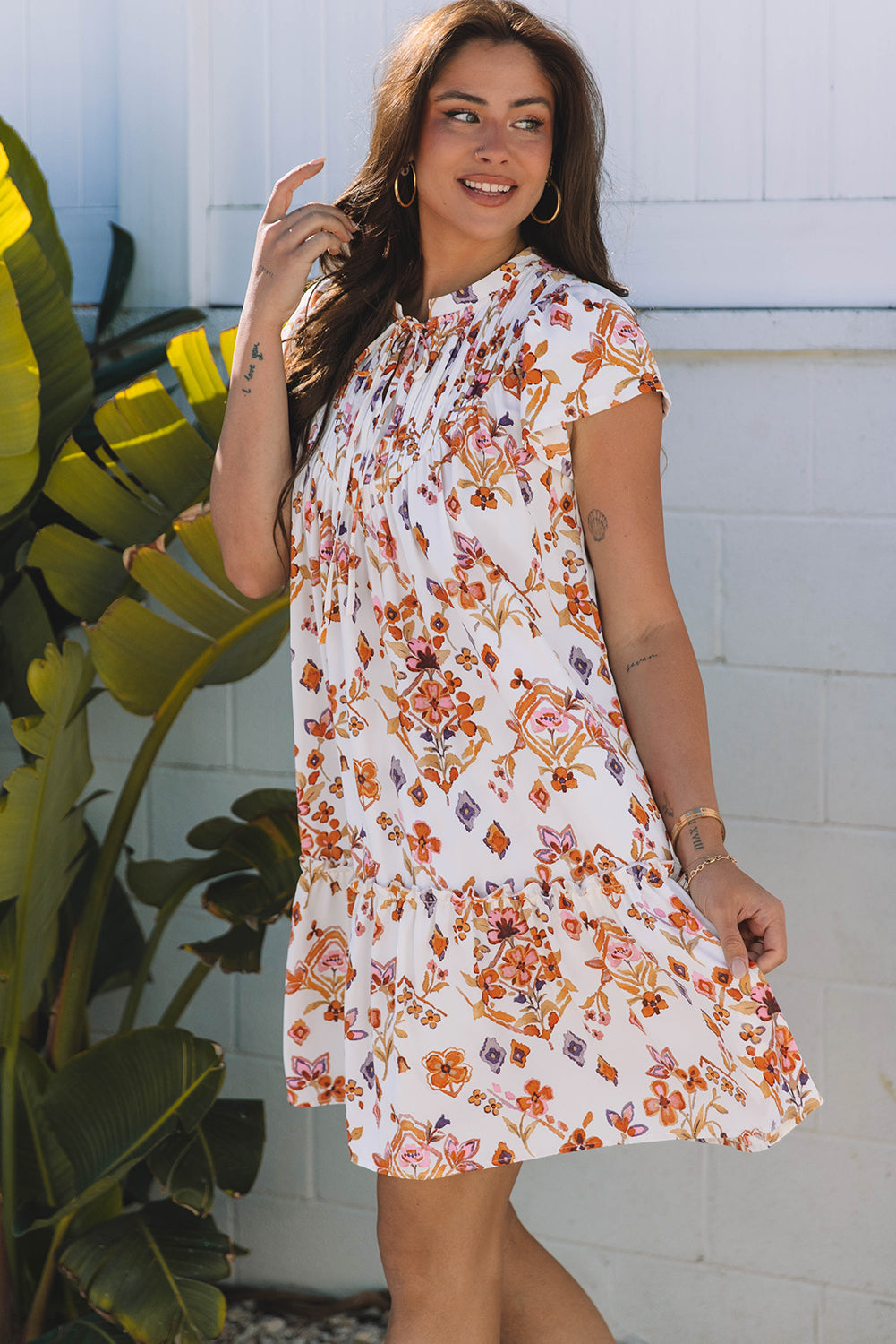 Bohemian flutter sleeve dress detail