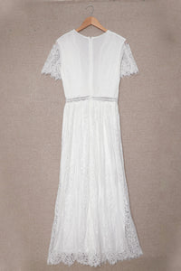 Flowy white boho dress closeup