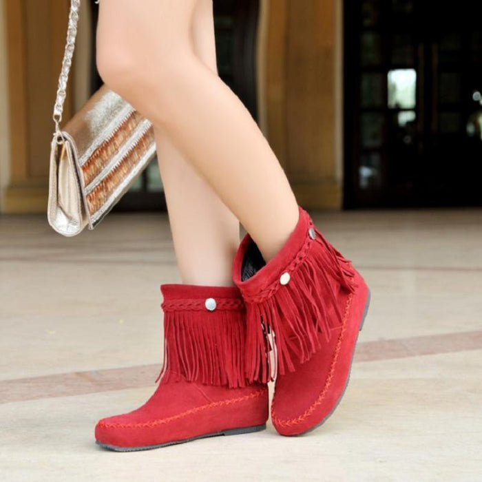Fringe boots stacked heel detail