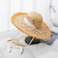 Tan woven straw bohemian sun hat
